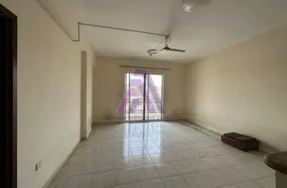 Empty Room image for: Apartment - 1 Bedroom - 2 Bathrooms for rent in Q02 - France Cluster - International City - Dubai, Image 1
