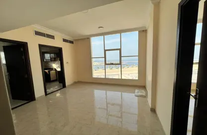 Apartment - 1 Bedroom - 1 Bathroom for rent in Corniche Tower - Ajman Corniche Road - Ajman