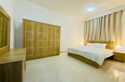 شقة - غرفة نوم - 2 حمامات للايجار في بناية النافورة 1 - 2  الروضة - الروضة - عجمان