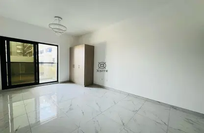 Empty Room image for: Apartment - 1 Bathroom for rent in Al Abeir Tower - Jumeirah Village Circle - Dubai, Image 1