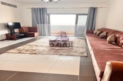 Living Room image for: Apartment - 2 Bedrooms - 2 Bathrooms for rent in Geepas Building 3 - Al Rashidiya 2 - Al Rashidiya - Ajman, Image 1