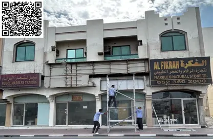 عمارة بالكامل - استوديو - 4 حمامات للبيع في تجارية مويلح - الشارقة