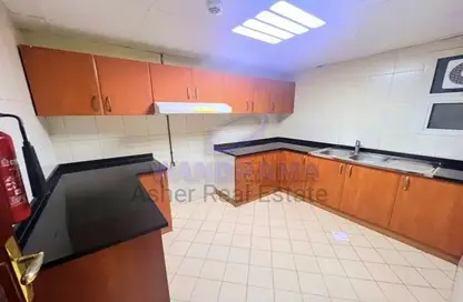 Kitchen image for: Apartment - 2 Bedrooms - 2 Bathrooms for rent in Dar Al Majaz - Jamal Abdul Nasser Street - Al Majaz - Sharjah, Image 1