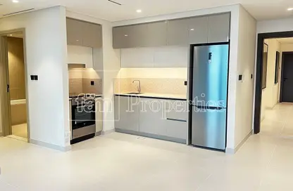 Kitchen image for: Apartment - 1 Bedroom - 1 Bathroom for rent in Marina Vista - EMAAR Beachfront - Dubai Harbour - Dubai, Image 1