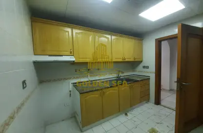 صورة لـ مطبخ شقة - غرفة نوم - 1 حمام للايجار في برج المسعود - شارع النجدة - أبوظبي ، صورة رقم 1