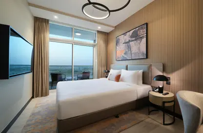 Room / Bedroom image for: Apartment - 1 Bedroom - 1 Bathroom for rent in Damac Hills 2 - Dubai, Image 1
