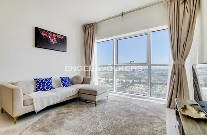 Living Room image for: Apartment - 1 Bedroom - 2 Bathrooms for sale in Carson C - Carson - DAMAC Hills - Dubai, Image 1
