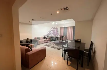 Living / Dining Room image for: Apartment - 1 Bedroom - 3 Bathrooms for rent in Al Rashidiya Towers - Al Rashidiya - Ajman Downtown - Ajman, Image 1