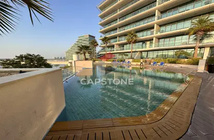 Pool image for: Apartment - 2 Bedrooms - 3 Bathrooms for rent in Al Naseem Residences A - Al Bandar - Al Raha Beach - Abu Dhabi, Image 1