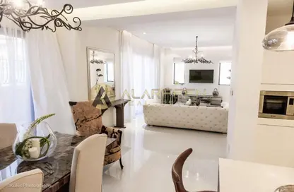 Living / Dining Room image for: Townhouse - 5 Bedrooms - 6 Bathrooms for sale in Bloomingdale Townhouses - Bloomingdale - Dubai Sports City - Dubai, Image 1