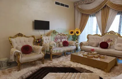 صورة لـ غرفة المعيشة شقة - 3 غرف نوم - 4 حمامات للبيع في أسواق للعقارات - Al Mamsha - مويلح - الشارقة ، صورة رقم 1