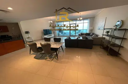 Living / Dining Room image for: Apartment - 2 Bedrooms - 2 Bathrooms for sale in Cornish Tower - Al Rumaila - Ajman, Image 1