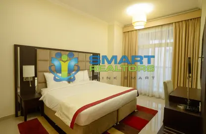 Apartment - 2 Bedrooms - 3 Bathrooms for rent in Siraj Tower - Arjan - Dubai