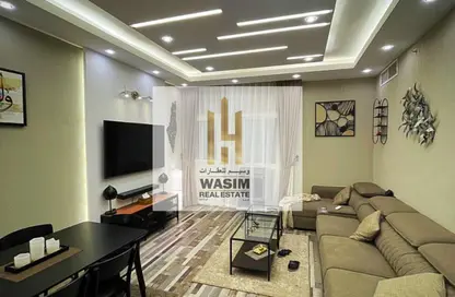 Apartment - 2 Bedrooms - 2 Bathrooms for sale in Orient Tower 2 - Orient Towers - Al Bustan - Ajman