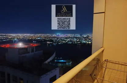 شقة - غرفة نوم - 2 حمامات للبيع في أورينت تاور 1 - أورينت تاور - البستان - عجمان