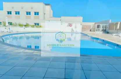 صورة لـ حوض سباحة شقة - 3 غرف نوم - 4 حمامات للايجار في مطار البطين - منطقة المرور - أبوظبي ، صورة رقم 1