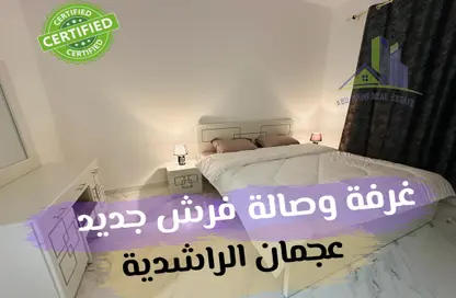 Room / Bedroom image for: Apartment - 1 Bedroom - 1 Bathroom for rent in Geepas Building 3 - Al Rashidiya 2 - Al Rashidiya - Ajman, Image 1