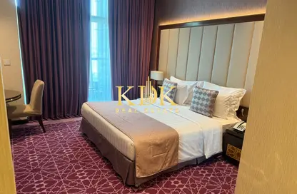 Apartment - Studio - 1 Bathroom for rent in Royal Continental Suites - Business Bay - Dubai