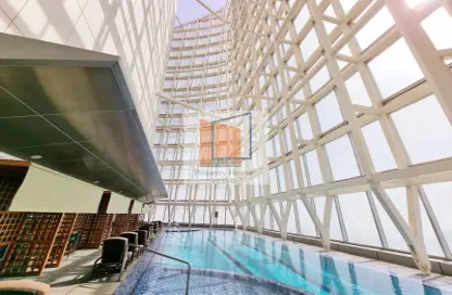Pool image for: Apartment - 3 Bedrooms - 4 Bathrooms for rent in Landmark Tower - Corniche Road - Abu Dhabi, Image 1