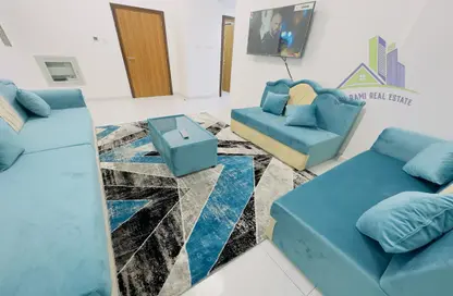Living Room image for: Apartment - 2 Bedrooms - 2 Bathrooms for rent in Gulfa Towers - Al Rashidiya 1 - Al Rashidiya - Ajman, Image 1