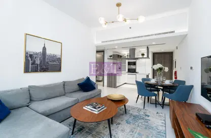Living / Dining Room image for: Apartment - 1 Bedroom - 2 Bathrooms for rent in Soho Palm Jumeirah - Palm Jumeirah - Dubai, Image 1