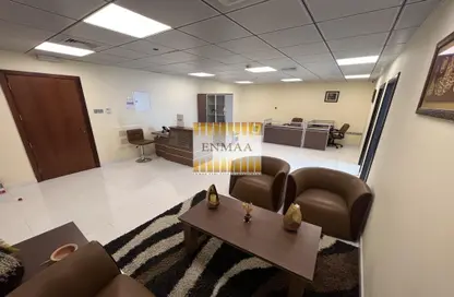 Living Room image for: Office Space - Studio - 1 Bathroom for sale in Julphar Towers - Al Nakheel - Ras Al Khaimah, Image 1