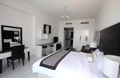 صورة لـ غرفة- غرفة النوم شقة - 1 حمام للبيع في جيوفاني بوتيك سويتس - مدينة دبي الرياضية - دبي ، صورة رقم 1