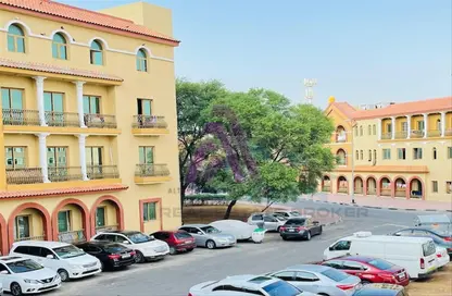 صورة لـ مبنى خارجي شقة - غرفة نوم - 2 حمامات للايجار في تي ٠٣ - طراز أسباني - المدينة الدولية - دبي ، صورة رقم 1