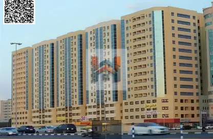 Apartment - 2 Bedrooms - 2 Bathrooms for sale in Mandarin Towers - Garden City - Ajman
