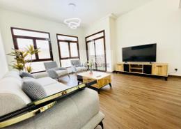 Living Room image for: Apartment - 1 bedroom - 2 bathrooms for rent in Fortunato - Jumeirah Village Circle - Dubai, Image 1