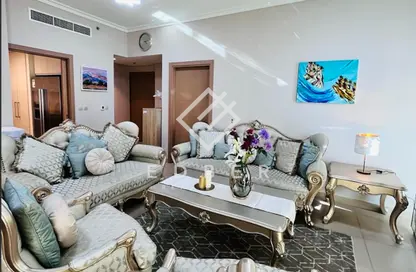 صورة لـ غرفة المعيشة شقة - 2 غرف نوم - 3 حمامات للايجار في برج فيستا - برج فيستا - دبي وسط المدينة - دبي ، صورة رقم 1