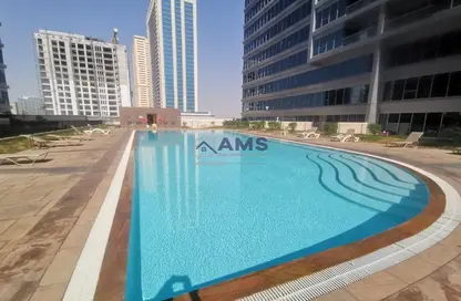 Pool image for: Apartment - 1 Bathroom for sale in Skycourts Tower B - Skycourts Towers - Dubai Land - Dubai, Image 1