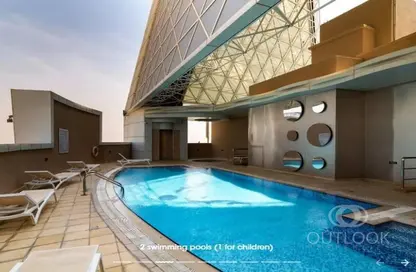 Pool image for: Apartment - 1 Bathroom for sale in Siraj Tower - Arjan - Dubai, Image 1