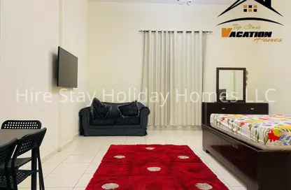 شقة - 1 حمام للايجار في اي سي 1- اماراتي - 10 - طراز إماراتي - المدينة الدولية - دبي
