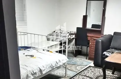 Apartment - Studio - 1 Bathroom for rent in Al Karamah - Abu Dhabi