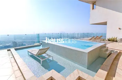Pool image for: Apartment - 4 Bedrooms - 5 Bathrooms for sale in FIVE at Jumeirah Village Circle - Jumeirah Village Circle - Dubai, Image 1