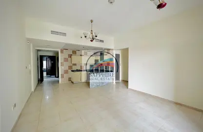 شقة - غرفة نوم - 2 حمامات للايجار في برج حمزة - مدينة دبي الرياضية - دبي
