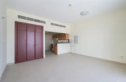 Apartment - Studio - 1 Bathroom for rent in Ice Hockey - Dubai Sports City - Dubai