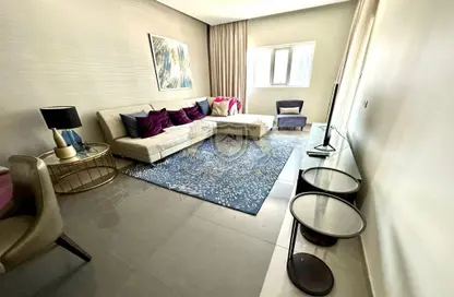 صورة لـ غرفة المعيشة شقة - 3 غرف نوم - 3 حمامات للبيع في داماك ماجستين - الخليج التجاري - دبي ، صورة رقم 1