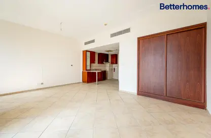 Empty Room image for: Apartment - 1 Bathroom for rent in Barton House 1 - Barton House - Motor City - Dubai, Image 1