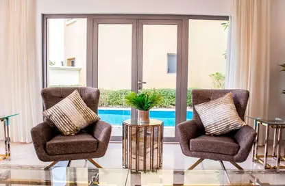 Living Room image for: Villa - 5 Bedrooms - 6 Bathrooms for rent in Garden Homes Frond D - Garden Homes - Palm Jumeirah - Dubai, Image 1