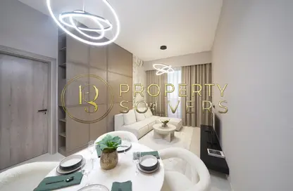 Living / Dining Room image for: Apartment - 1 Bathroom for sale in Amal Tower - Dubai Sports City - Dubai, Image 1