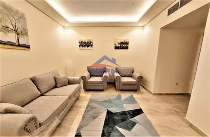 Living Room image for: Apartment - 1 Bedroom - 1 Bathroom for rent in Mushrif Park - Al Mushrif - Abu Dhabi, Image 1