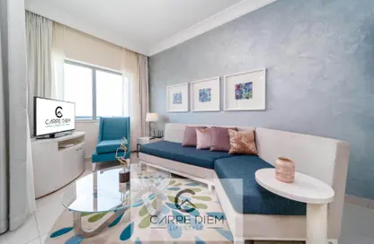 Living / Dining Room image for: Apartment - 1 Bedroom - 2 Bathrooms for rent in Damac Maison Mall Street - Downtown Dubai - Dubai, Image 1