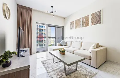 Living Room image for: Apartment - 1 Bedroom - 1 Bathroom for rent in MAG 565 - MAG 5 - Dubai South (Dubai World Central) - Dubai, Image 1