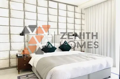Apartment - 1 Bedroom - 2 Bathrooms for sale in Millennium Atria Business Bay - Business Bay - Dubai