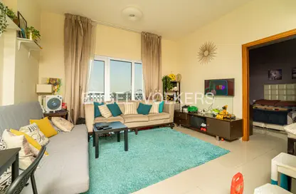 Living Room image for: Apartment - 1 Bedroom - 1 Bathroom for sale in Suburbia Podium - Suburbia - Downtown Jebel Ali - Dubai, Image 1