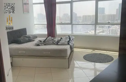 Apartment - 1 Bedroom - 2 Bathrooms for sale in Orient Tower 2 - Orient Towers - Al Bustan - Ajman