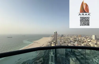Apartment - 2 Bedrooms - 3 Bathrooms for sale in Corniche Tower - Ajman Corniche Road - Ajman