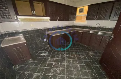 صورة لـ مطبخ شقة - 2 غرف نوم - 3 حمامات للايجار في السيدرا - الخبيصي - العين ، صورة رقم 1